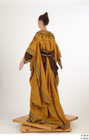  Photos Woman in Historical Dress 12 15th century Medieval Clothing a poses brown dress 0004.jpg